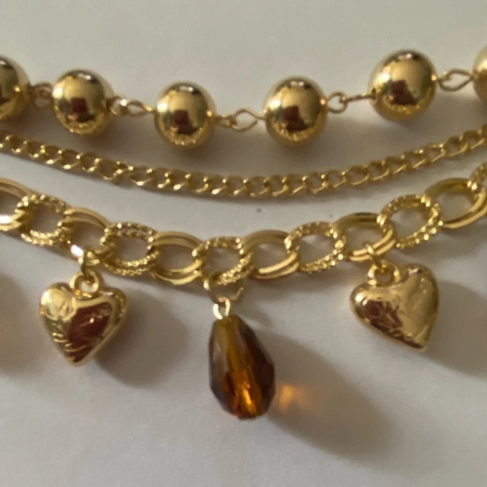 None boutique gold